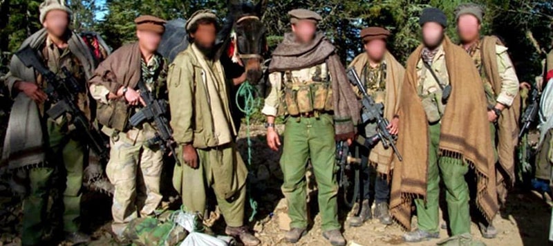 Delta Force operators blending in with locals in Afghanistan.