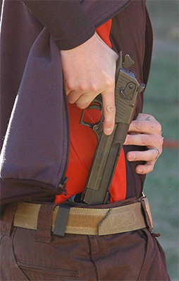 A demonstration of IWB carry. The carrier is drawing a Desert Eagle (a HUGE pistol).
