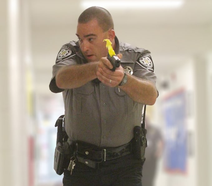 An officer goes through a training exercise.